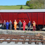 The newly-overhauled CCT with volunteers posing in front of the fine paintwork