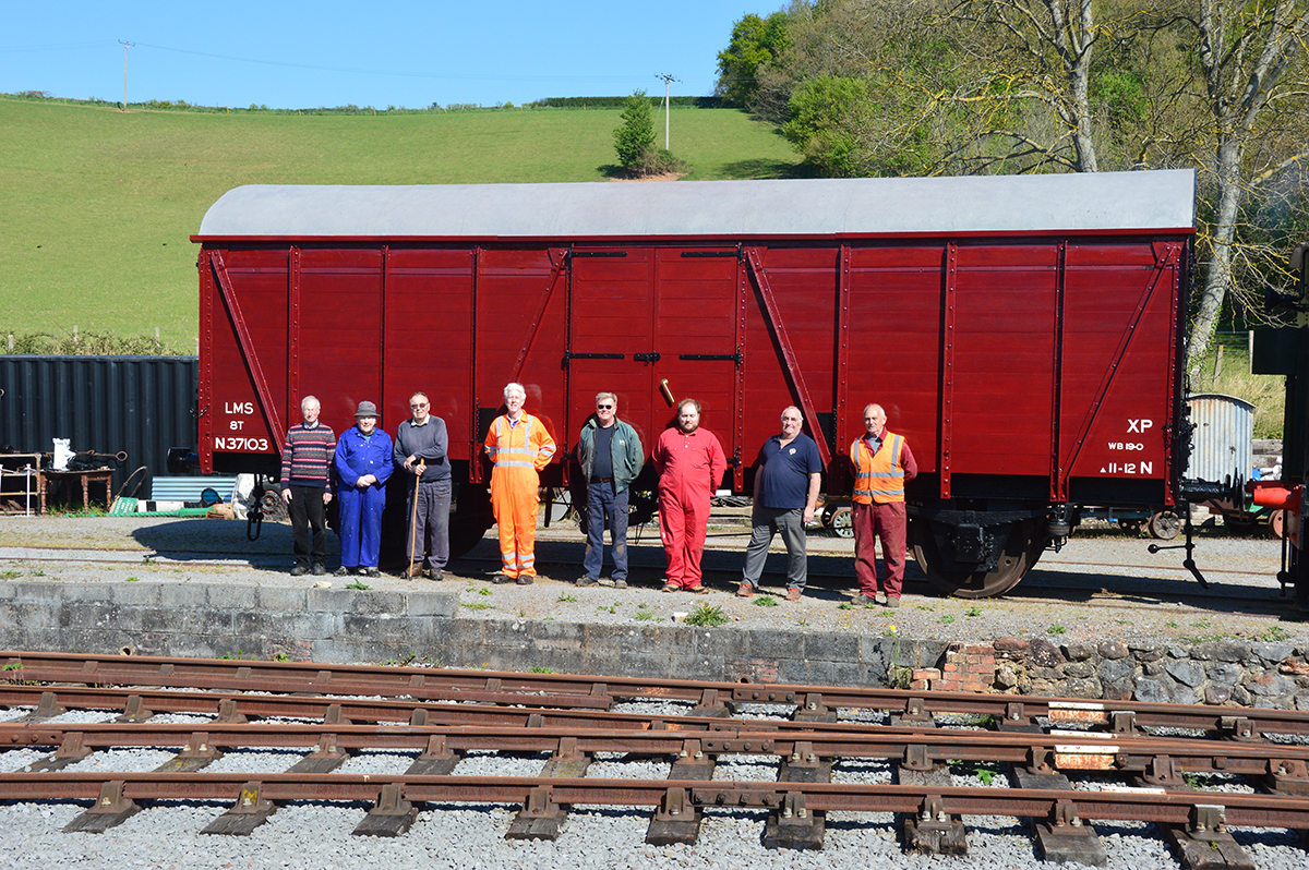 The newly-overhauled CCT with volunteers posing in front of the fine paintwork