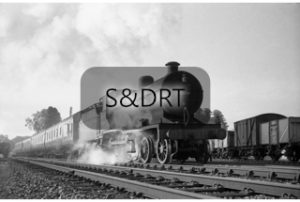 Shillingstone; 40698 leaving with Up passenger service, 1959; G A Richardson