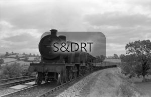 Prestleigh; 40634 and 34029 'Lundy' on Up through service passing over viaduct; G A Richardson