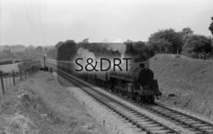 Wellow; 73024 and 34028 'Eddystone' on Up through service; G A Richardson