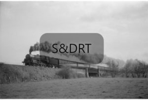 Hodmoor; 73028 at bridge 185 on Up passenger service, with smoke