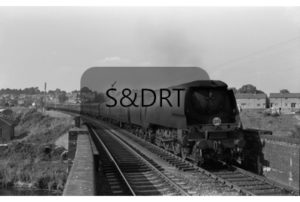 Blandford; 34043 'Combe Martin' on Down 'Pines Express' of 12+ carriages, 1961