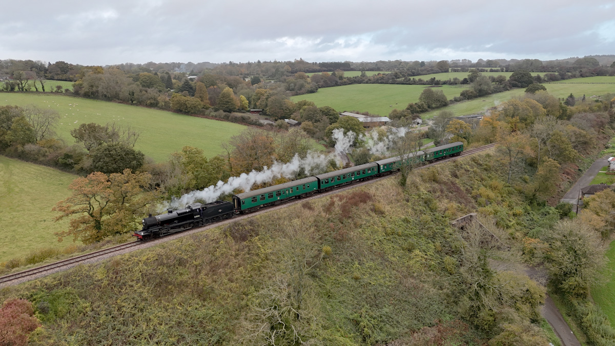 53808 on the high embankment west of Medstead, heading for Ropley