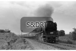 Corfe Mullen bank; 34046 'Braunton' on the Down 'Pines Express', 1961