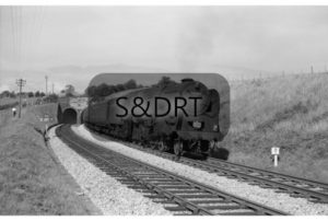 Chilcompton Tunnel; 92245 on 1O94 Bradford-Bournemouth service, summer 1962; G A Richardson
