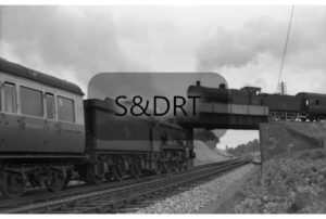 Cole; 53805 on S&D bridge, 7029 'Clun Castle' passing below on GWR line, 08-60; G A Richardson
