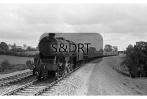 Masbury; 44867 & 34029 'Lundy' on 12.20 pm (SO) Bournemouth-Nottingham service, 04-08-62; G A Richardson