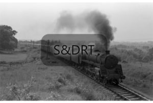 Corfe Mullen bank; 73019 on the Down 'Pines Express' (different date, 12 carriages) ; G A Richardson