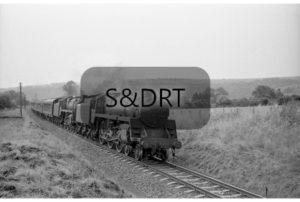 Shillingstone; 73049 & Class 5 north of station with Up passenger service, 1959; G A Richardson