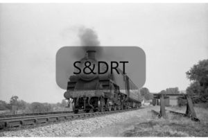 Shillingstone; 82039 leaving station with Up passenger service - note Trap Points indicator, 1959; G A Richardson