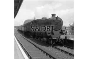 Shillingstone; 73087 'Linette' with Down passenger service, 1957 (1) - drawing in to platform; G A Richardson