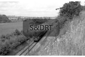 Stourpaine; 73087 'Linette' on Down service, Halt in background, 1960; G A Richardson