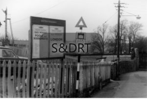 Midsomer Norton South; timetable board and low bridge warning sign, 1962
